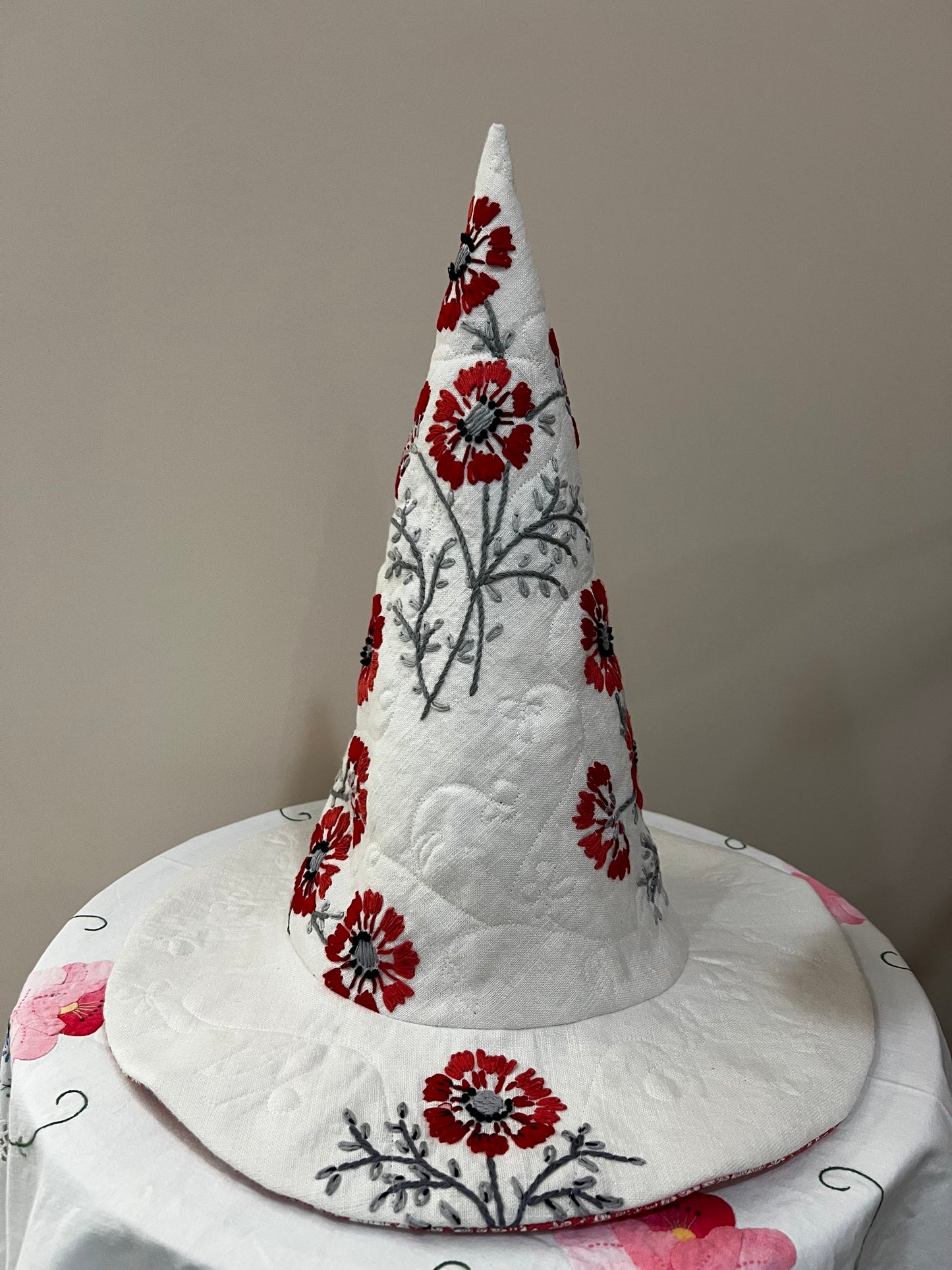 Red and coral floral embroidered hat
