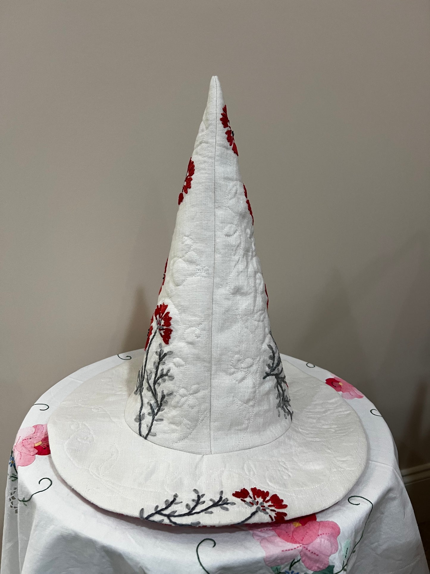 Red and coral floral embroidered hat
