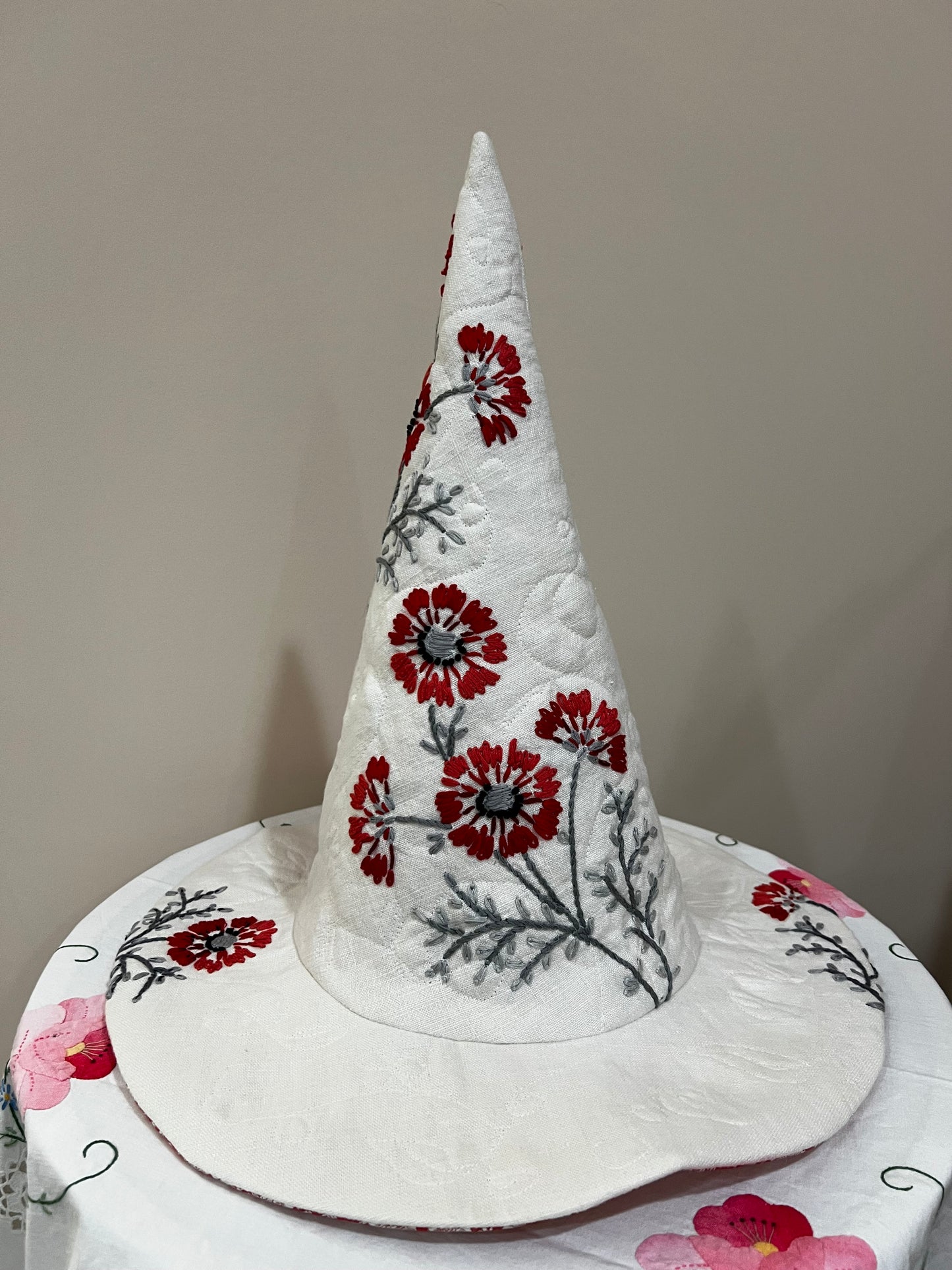 Red and coral floral embroidered hat