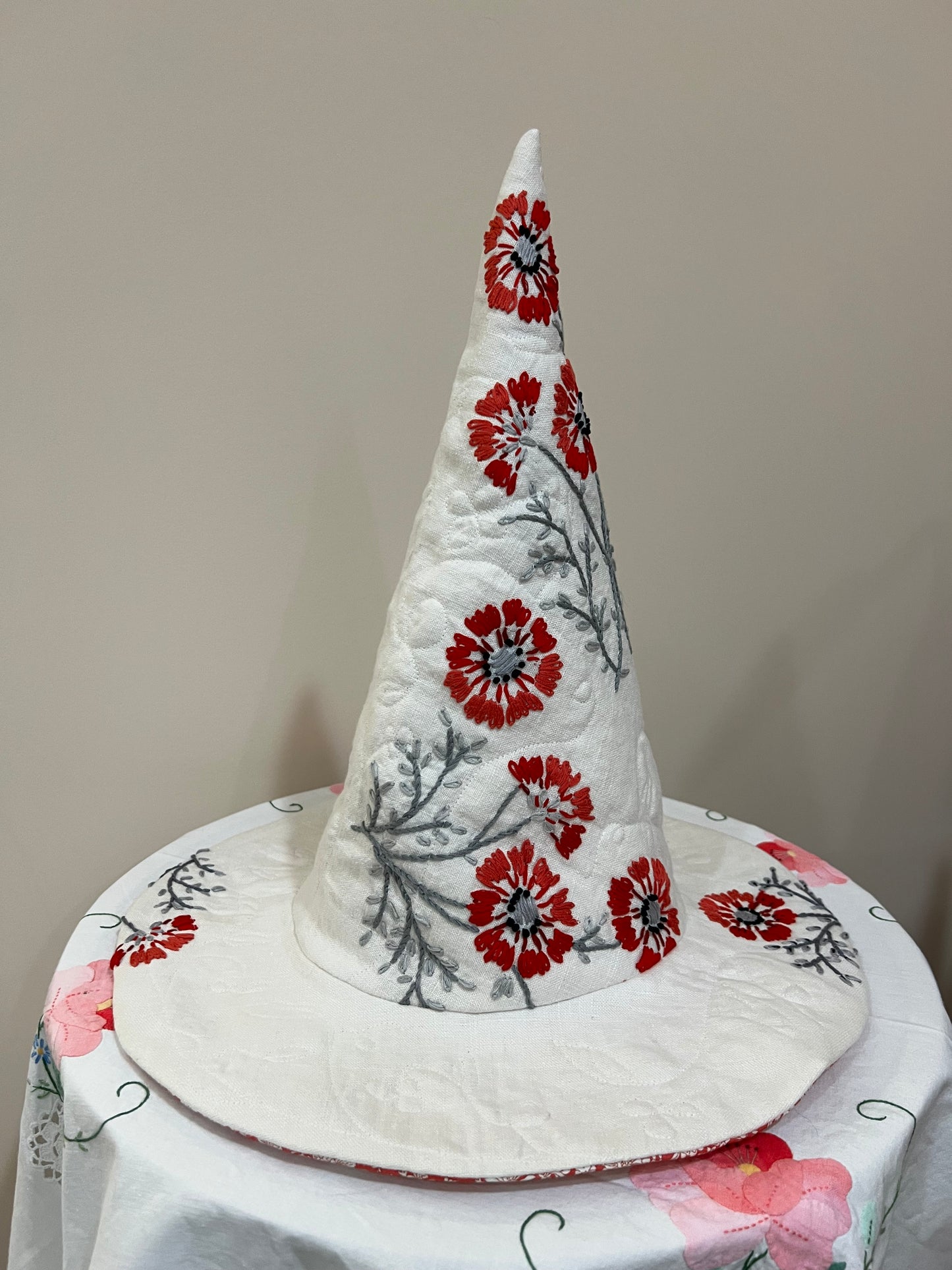 Red and coral floral embroidered hat