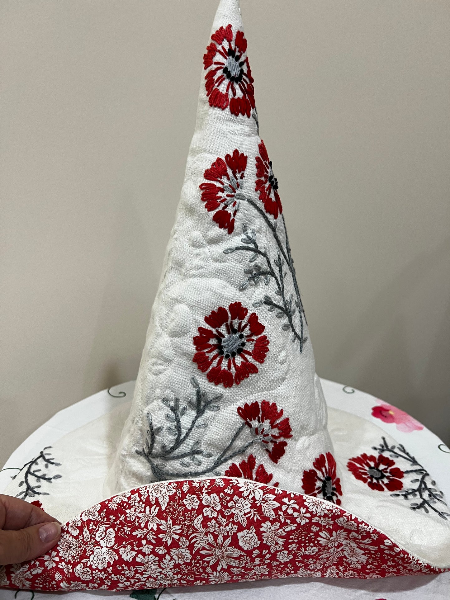 Red and coral floral embroidered hat