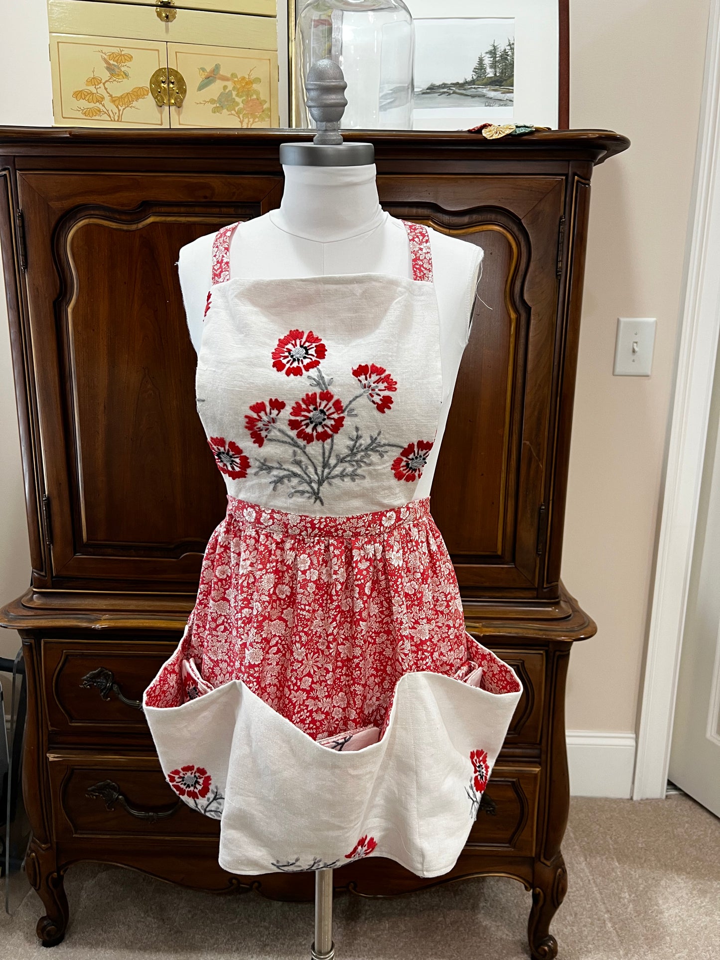 spell working apron in coral and red embroidery