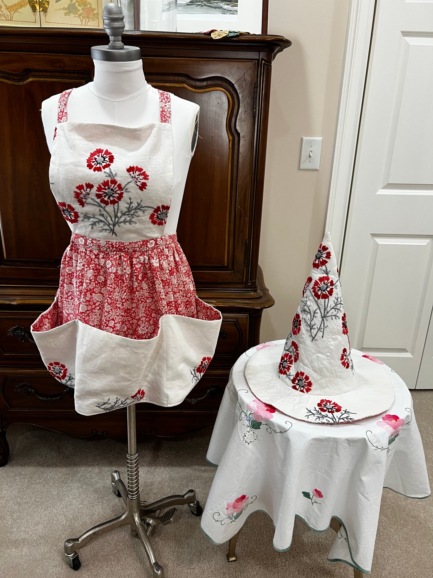 spell working apron in coral and red embroidery