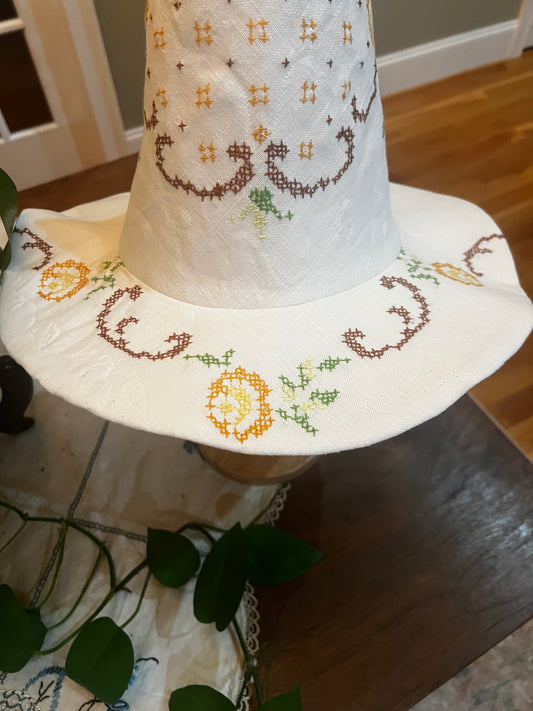 Ochre, brown and green witches hat