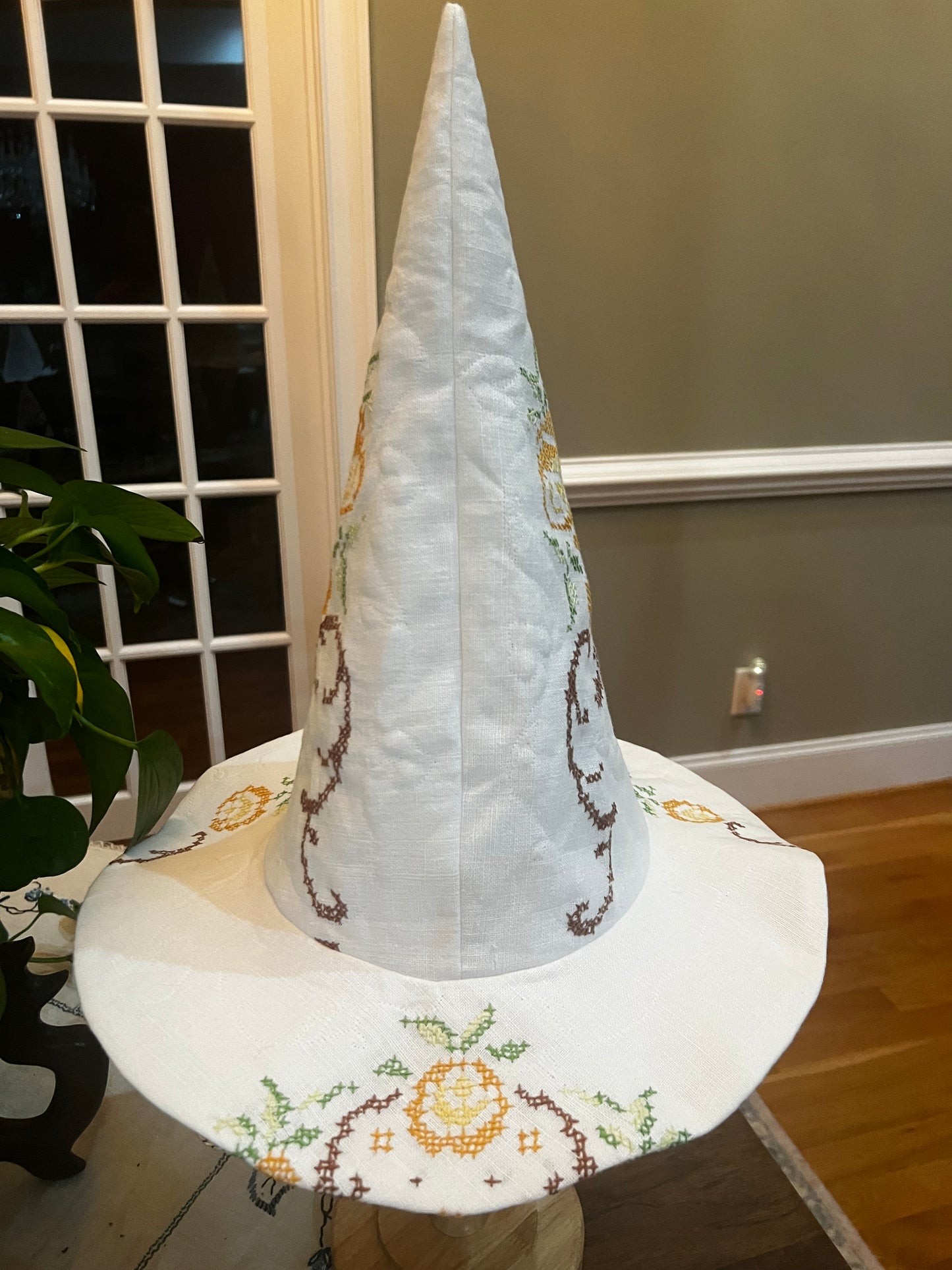 Ochre, brown and green witches hat