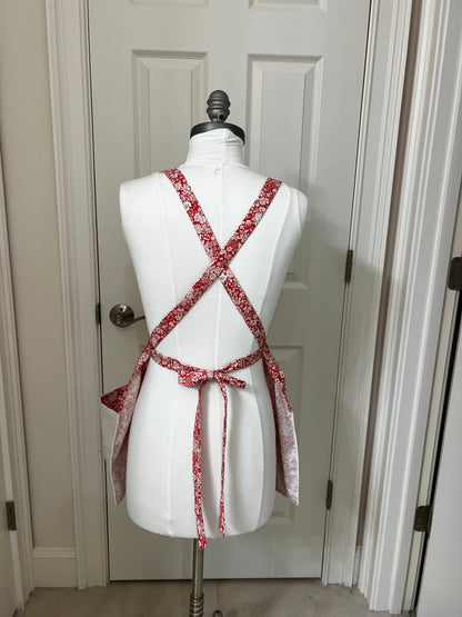 spell working apron in coral and red embroidery
